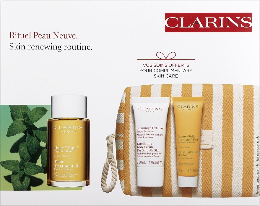 Clarins Rituel Peau Neuve — cofanetto corpo rinnovante (olio 100 ml + scrub 30 ml + balsamo 30 ml + pochette)
