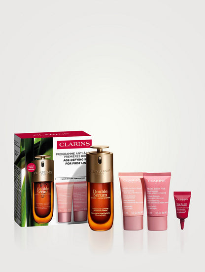 Clarins Age-Defying For First Lines — set anti-età siero 50 ml + contorno occhi 3 ml + crema 15 ml x2